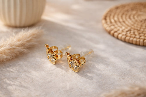 Arete Bañado en oro 18k Caracol con circones niña