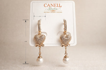 Aretes Corazón con brillo de circonitas y perla colgante